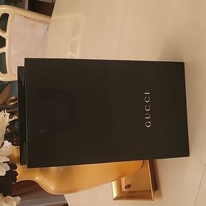 Black Gucci shopping bag